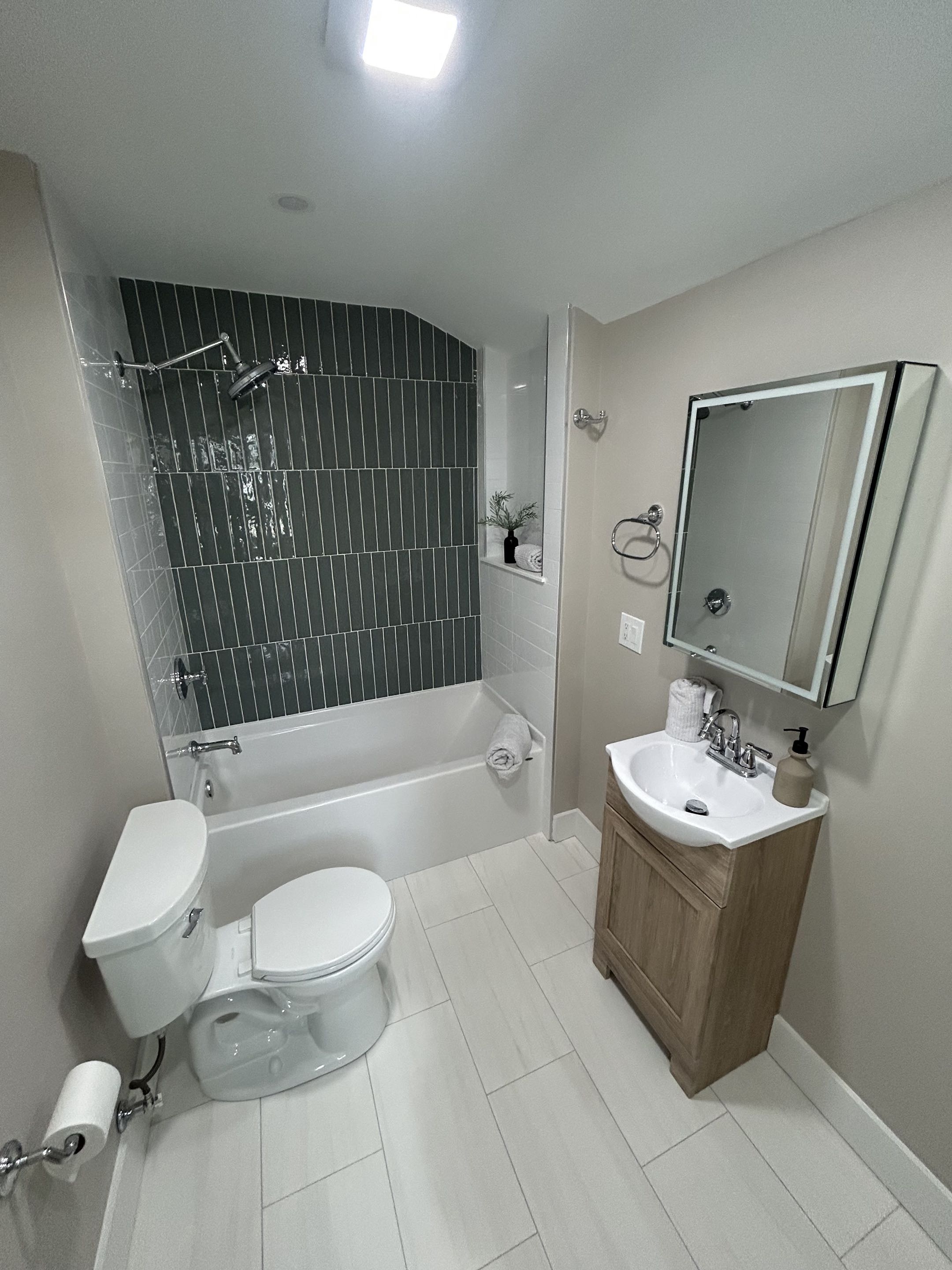 Dark Tile Bathroom — photo 1